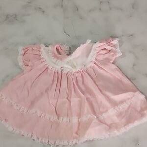 Vintaje Adorable Pink Baby Dress with Ruffle Details